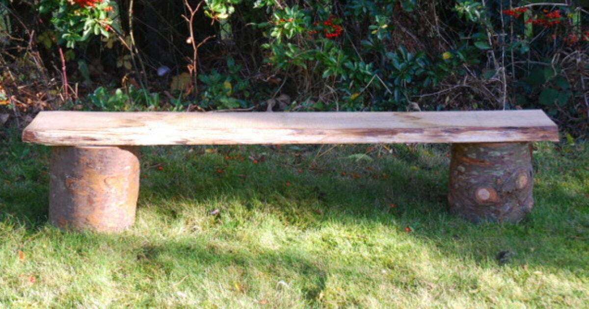 Rustic outdoor log clearance bench