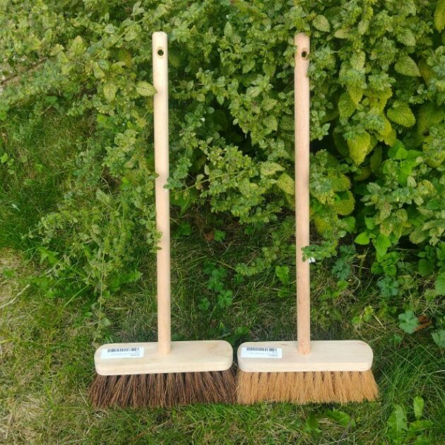 Wooden Brooms Muddy Faces