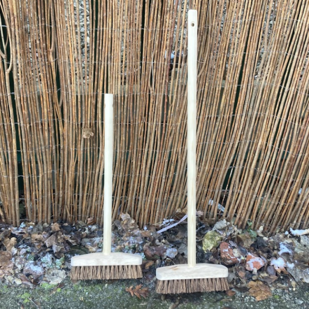 Wooden Brooms Muddy Faces