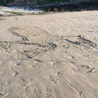 big drawing in sand