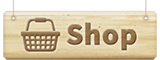 wooden sign with a shopping basket icon and the word 'shop'