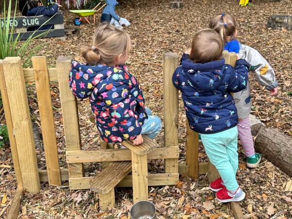 Muddy Faces MFW4500 Footpath Stile 80cm child sat on stile near other children Blossom Years 2 60x60