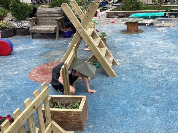 MFW4613 Ladder Stile Set St Patricks Family Learning Centre child crawling under fence flap cropped 60x60