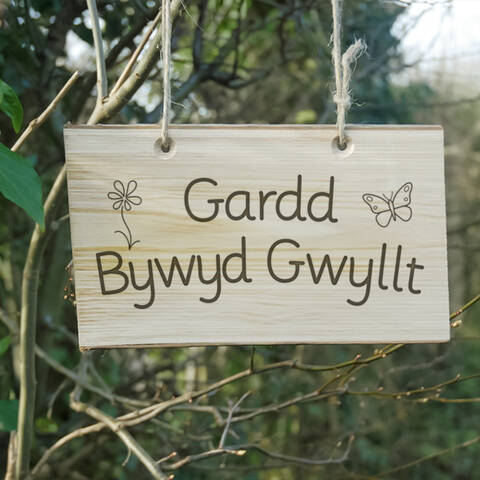 Wooden sign - Gardd Bywyd Gwyllt (Welsh - Wildlife garden)