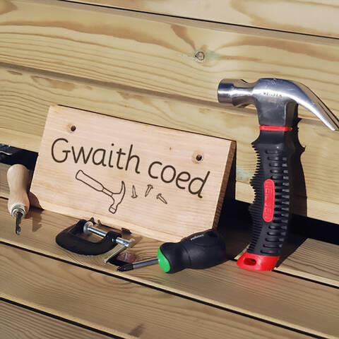 Wooden sign - Gwaith coed (Welsh - Woodwork)